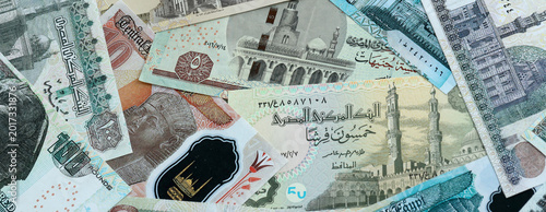 Fényképezés Egyptian pound money banknotes pile on table