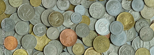 Konstfotografi Scattered coins of multiple origins in big mound, detailed shot