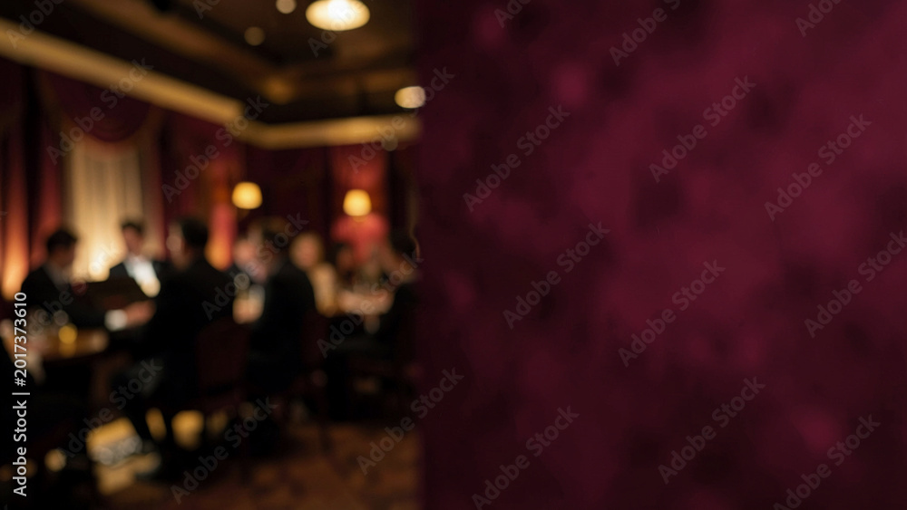 Naklejka premium Elegant dinner gathering in a sophisticated restaurant setting