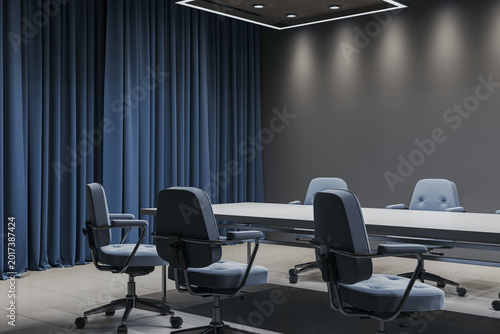 Modern empty corporate conference room interior featuring blue chairs, long m...
