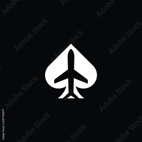 Фотография Airplane icon incorporated into a spade symbol for travel and aviation