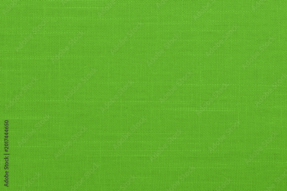Fototapeta premium Light green linen fabric cloth texture background, seamless pattern of natural textile.