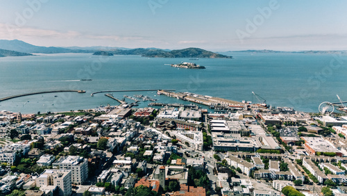 Drone view of San Francisco bay waterfront with Alcatraz Island and harbor