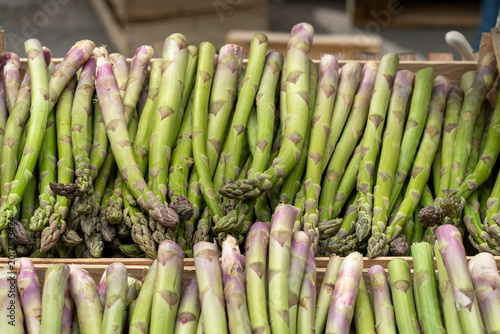 green asparagus bundles at farmers market