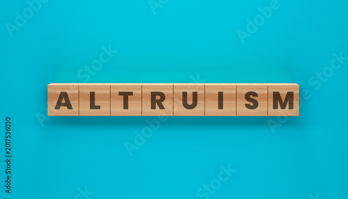 Photos Altruism Block Puzzle: A vibrant shot of wooden blocks spelling out the word altruism against a solid blue backdrop