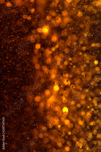 High resolution photo of a richly textured liquid cognac or whisky