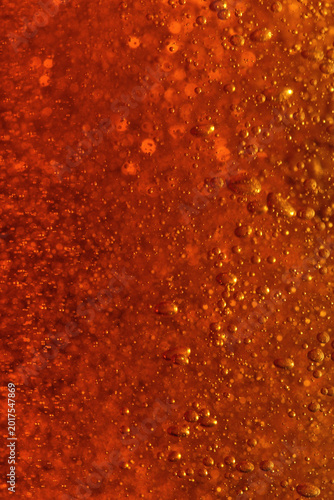High resolution photo of a richly textured liquid cognac or whisky