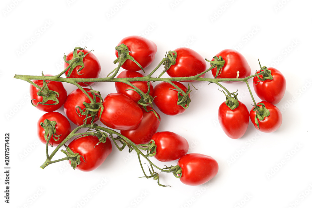 Naklejka premium Cherry tomatoes on vine isolated on white background. Fresh red tomato bunch close up. Organic vegetables for healthy cooking and salad preparation. Natural food ingredient composition.