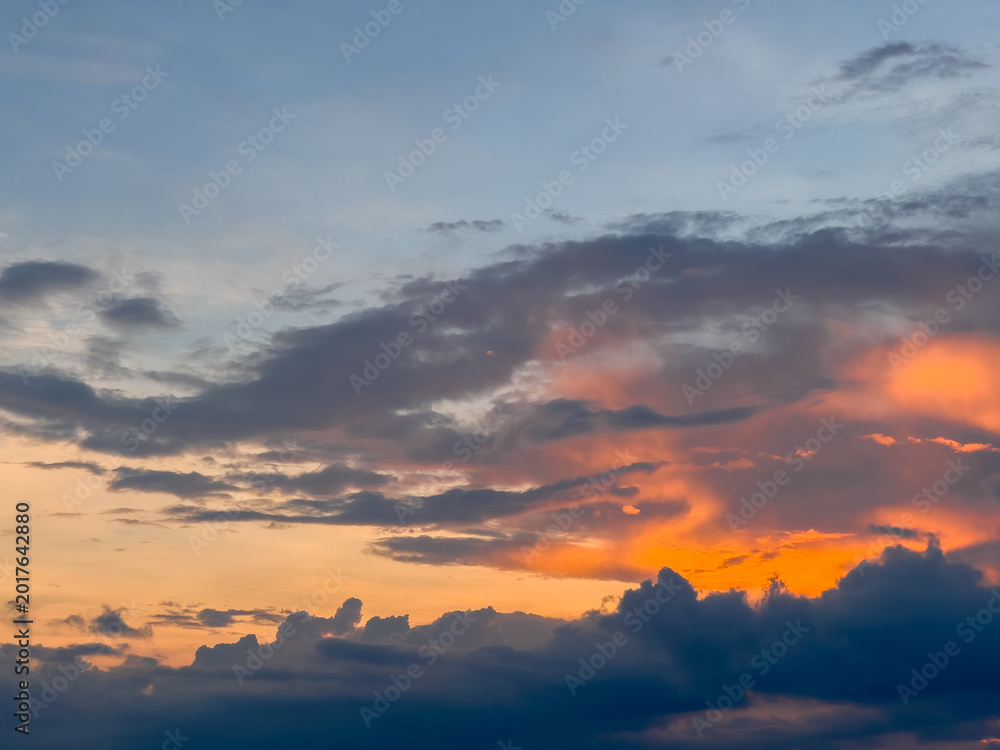 Obraz premium Dramatic Sunset Sky with Clouds