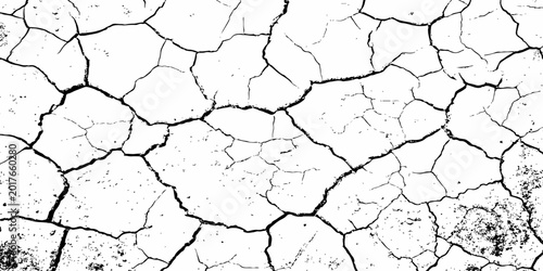 Natural cracked dry ground texture with deep soil fissures and rough drought surface details for abstract backgrounds.