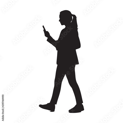 Silhouette of a woman with ponytail holding a smartphone and walking female person de