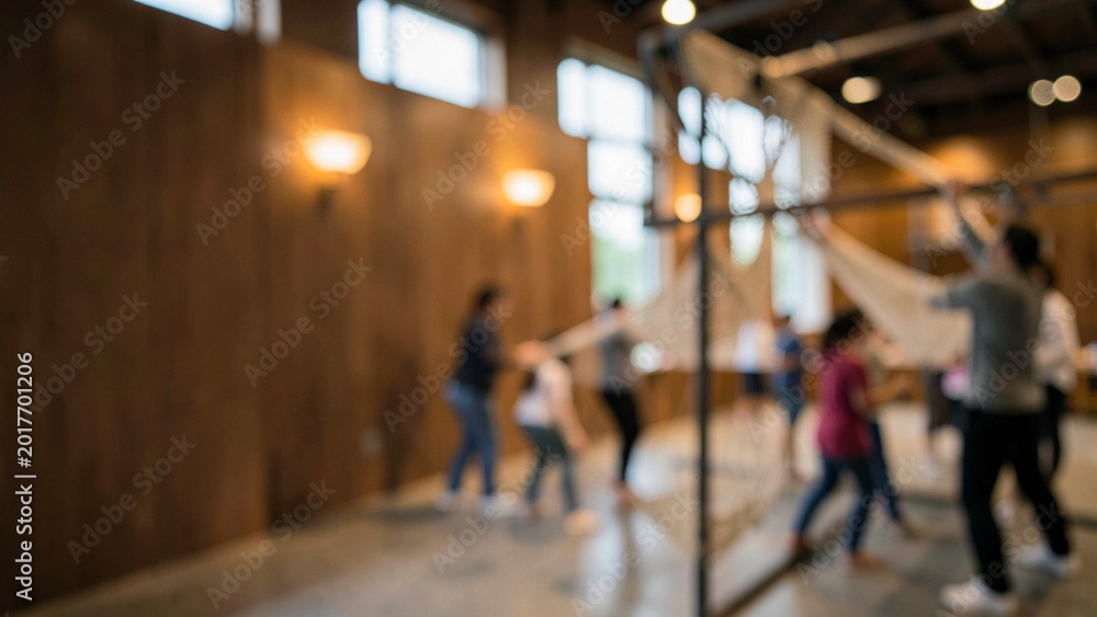 Obraz premium Group practicing movement in a bright modern wellness studio