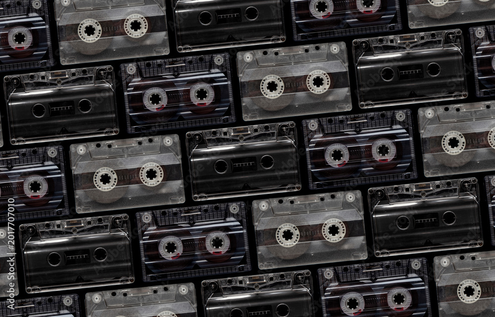 Φωτογραφία Vintage music cassettes on black background