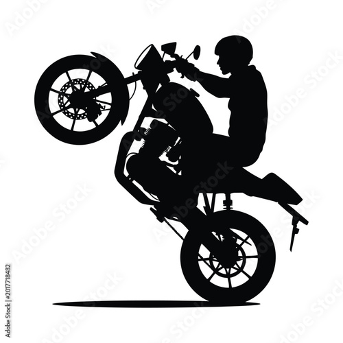 Tableau sur toile Motorcycle and rider silhouette performing a wheelie on a white background