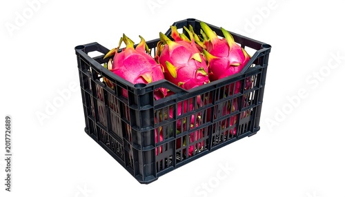 Several vibrant pink and green exotic fruits sit in a black plastic crate, isolated on white