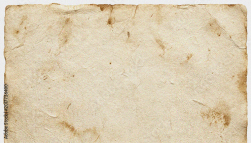 Foto Vintage paper texture with brown stains.