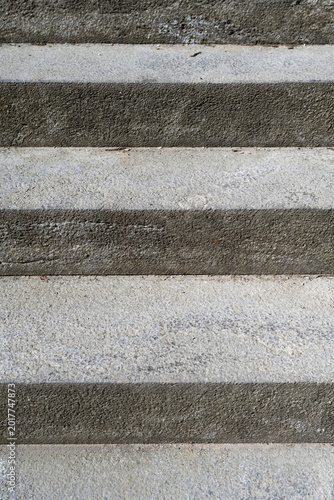 gray stone stairs with rug surface, no person, vertical format