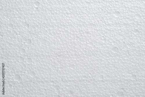 White polystyrene foam texture with porous surface and abstract bubble pattern.  Abstract minimal background for graphic design, overlays and creative design projects.