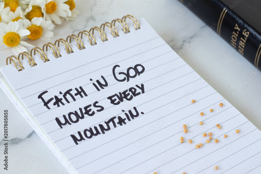 Naklejka premium Faith in God moves every mountain, inspirational text with mustard seeds and holy bible book. Belief and trust in Jesus Christ, biblical concept. Close-up.