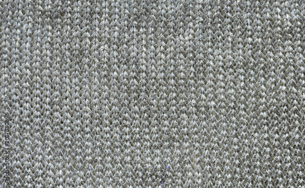 Fototapeta premium Seamless knit shiny texture. White knitted background. Shiny knitted wallpaper with copy space. Grey glittery textile. Winter, holiday, Christmas, sale concept.