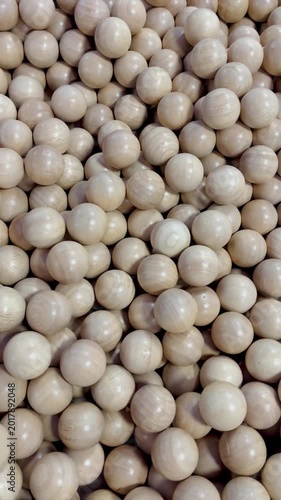 Many wooden balls natural background