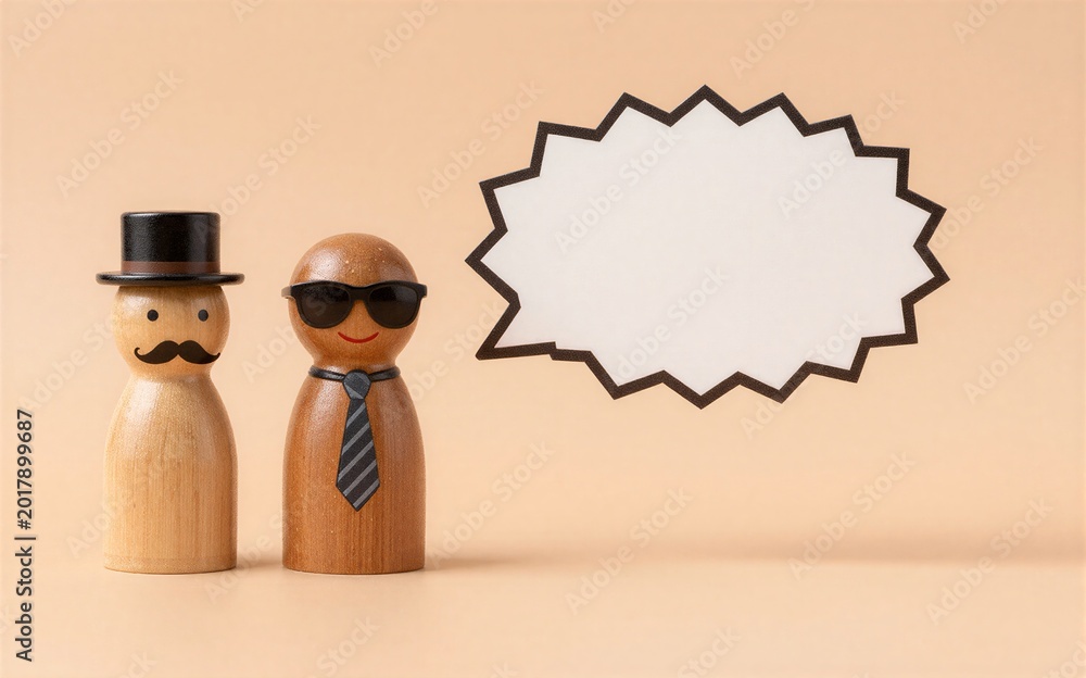 Naklejka premium Two wooden peg men one with a mustache and top hat the other in