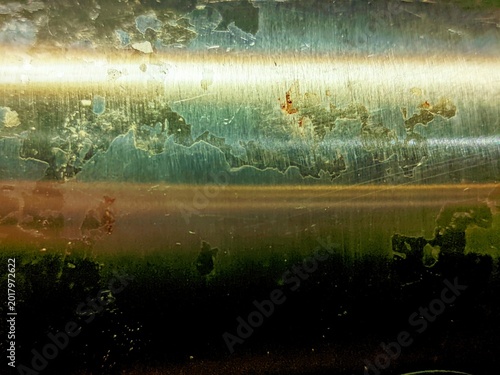 Fotografía A raw industrial texture map, features a reflective steel cylinder with unique p