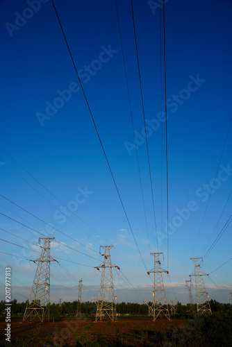Pylon, high-voltage tower sky background.
