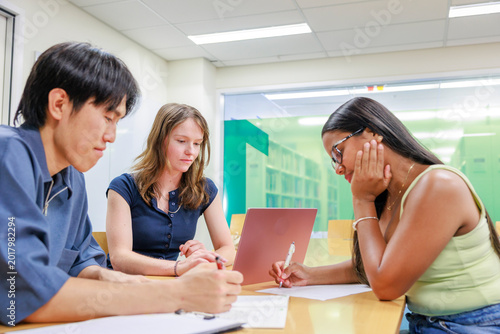 University Students Having Meeting in Lecture Hall