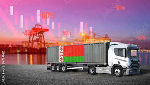 Billede på lærred Truck and Container: A semi-truck container, adorned with a flag, journeys onward against a backdrop of financial indicators