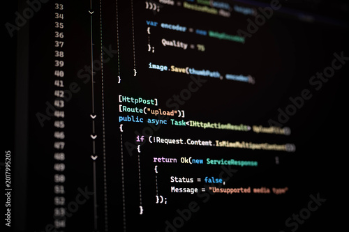 Foto Close up of HTTP POST API upload function source code displayed in dark mode editor