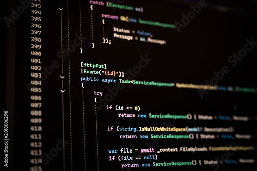 Plakat Close up of HTTP PUT API source code displayed in dark mode code editor. Backend software development, web application update process, server technology and programming concept.