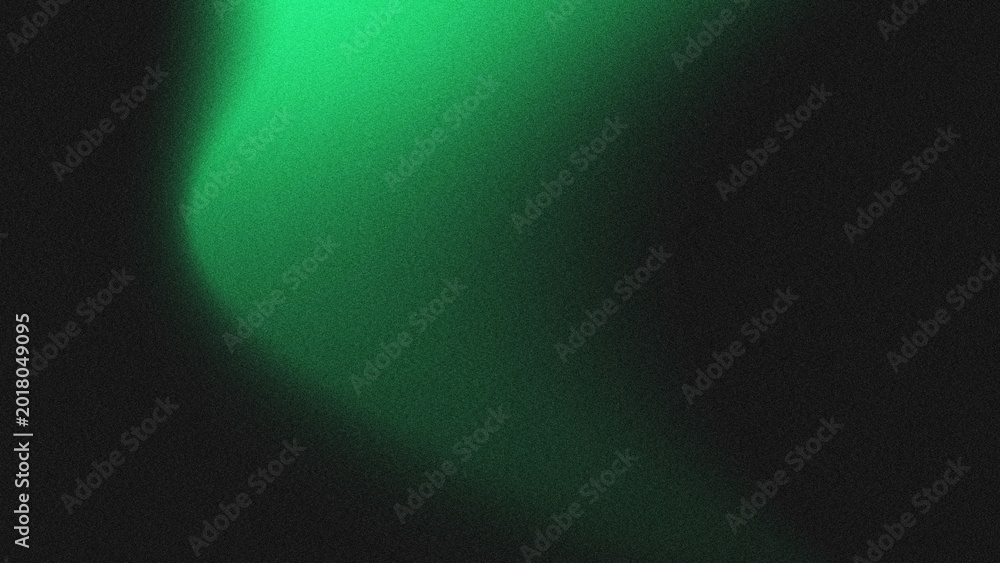 Fototapeta premium Abstract grainy green gradient background with soft light effect on black backdrop.