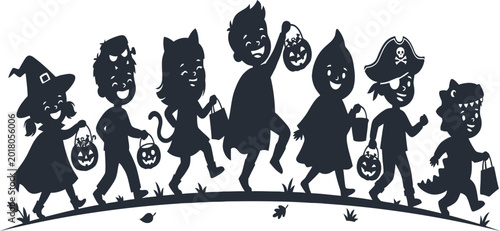Fotografía Black silhouettes of children in halloween costumes trick or treating
