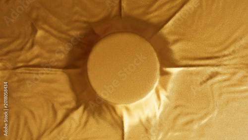 Shimmering gold fabric is placed on a spherical object. The background is beautiful with sparkling waves and folds. 3D rendering.