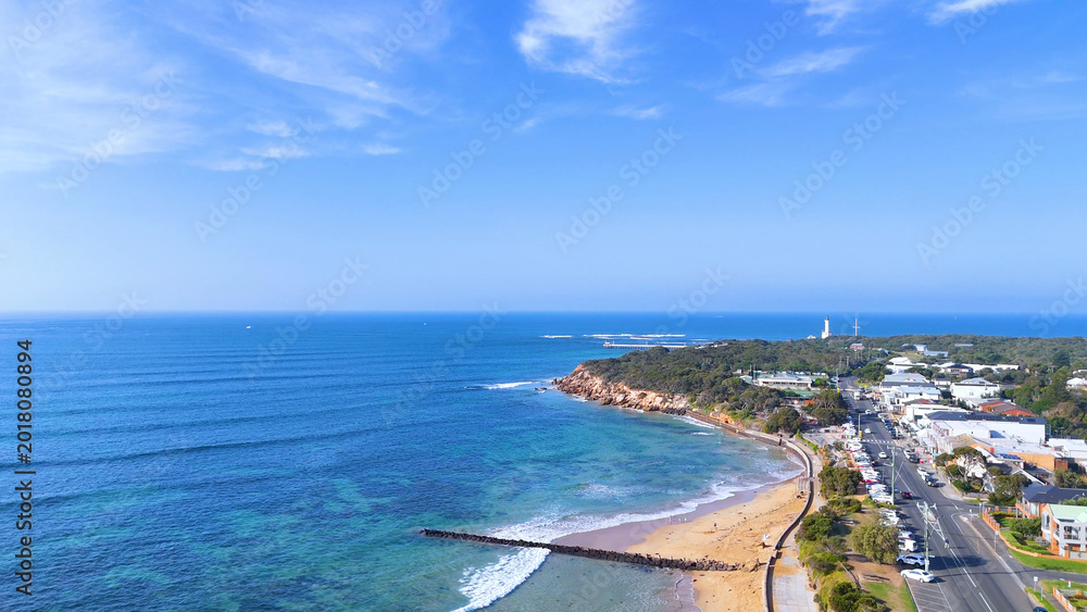 Obraz premium Aerial View of Point Lonsdale Coastline with Blue Ocean and Beach