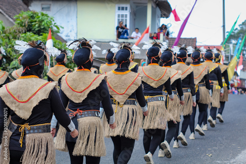Photography Indonesia, 28 Mei 2026, women marching in traditional Papuan costumes during Indonesian Independence Day celebration
