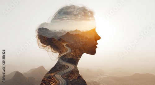 Double Exposure Silhouette of Womans Profile Merged with Mountain Landscape at Sunset.