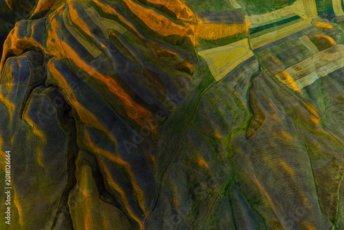 Aerial View of Rolling Agricultural Fields at Golden Hour