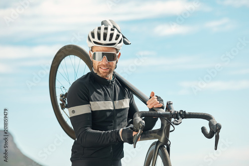 Fitness, cycling and sunglasses with man outdoor for workout, triathlon practice and journey. Wellness, bicycle training and transport with person on bike in road for exercise, health and athlete