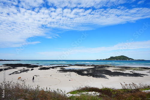 fine sea view with island and clouds