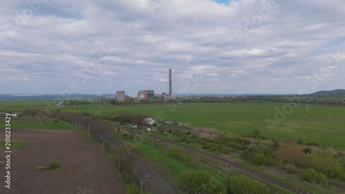 Aerial Close Up of Thermal Power Plant with Railway and Fields in Romania