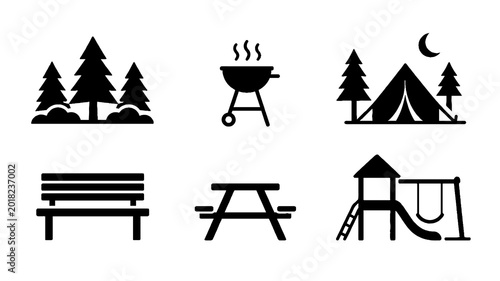 Camping and Park Recreation Black Silhouette Icon Set. Vector illustration featuring forest, barbecue grill, camping tent, bench, picnic table, playground, and outdoor leisure symbols isolated on whit