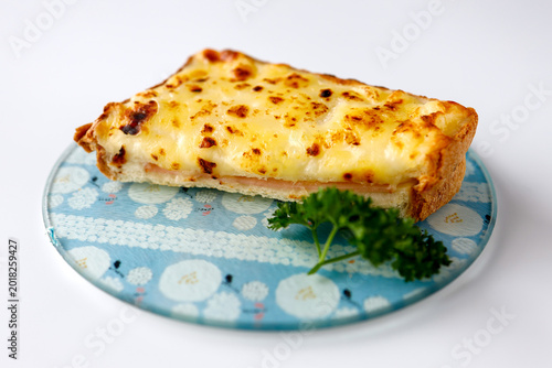 Bild auf Leinwand Croque Monsieur with Melted Cheese on White Background
