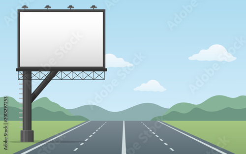 Large roadside billboard mounted beside empty rural highway