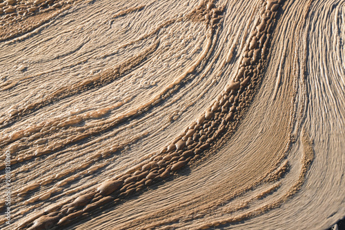 Tableau sur toile Close-up of Water Surface Foam and Layered Mineral Texture