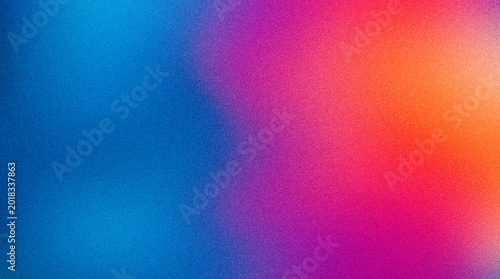 Abstract background with a vibrant gradient of blue, purple, and orange colors with a grainy texture