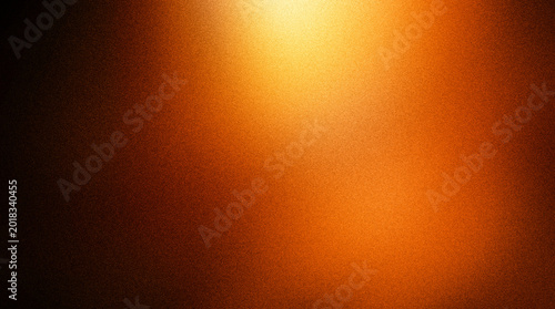 Schilderij op canvas Abstract texture of a grainy orange surface with a bright light source in the up