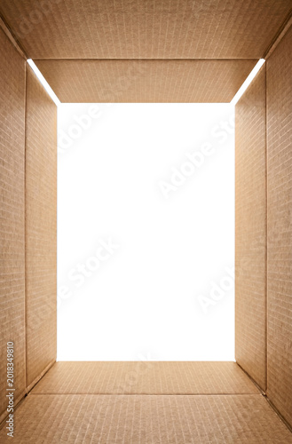 Interior perspective of a brown cardboard box with bright white exit