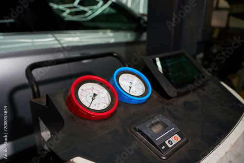 Fotografía Close up of quick couplers connected to AC lines for car climate service